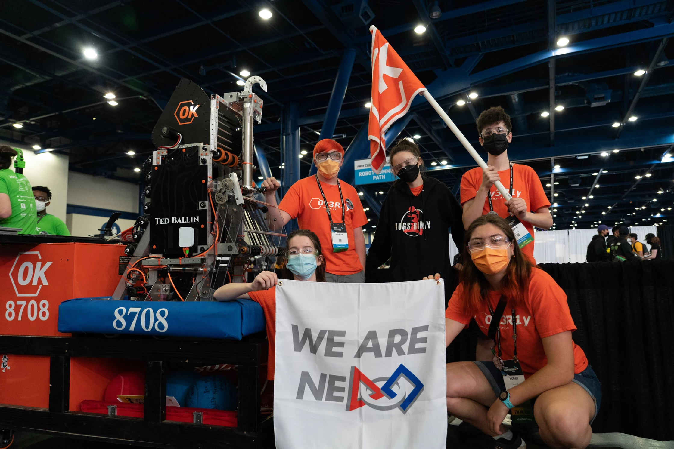 A few of us at worlds w/ robot, and we are NE first flag, with our ok flag in the background.